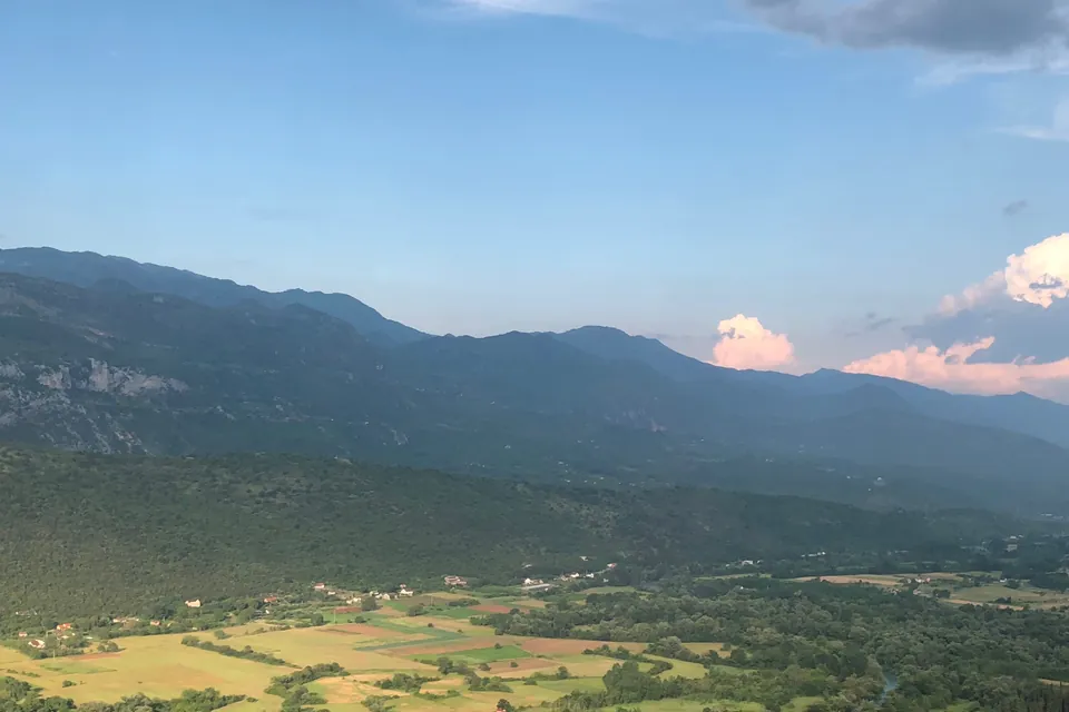 View of the Bjelopavlići plain from the M3 highway at dusk near Danilovgrad.