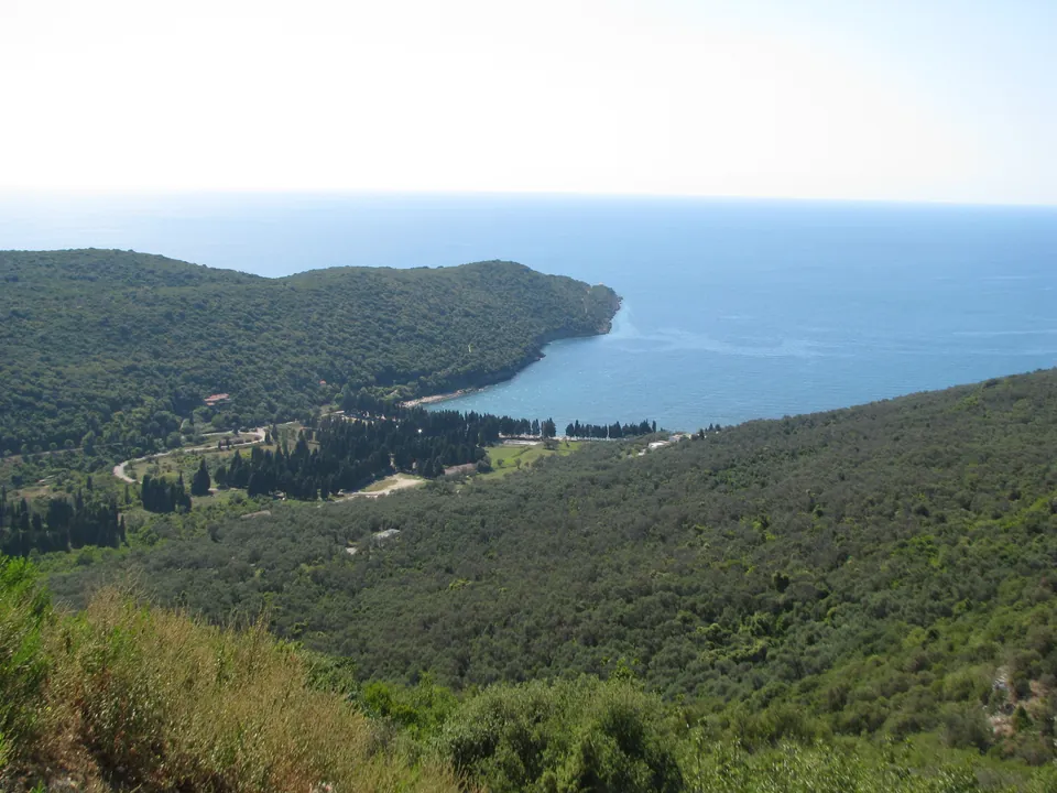 Aerial view of the wooded Valdanos cove and beach near Ulcinj, Montenegro coastline.
